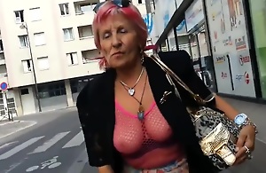 Sexy granny whith see thru top in public
