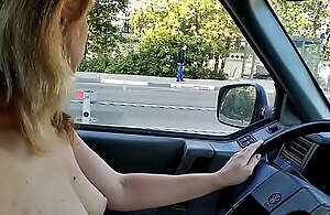 Marta Bellefleur drives naked to work