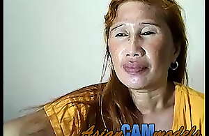 Asian MILF Spanks Her Full-grown Pussy On Webcam
